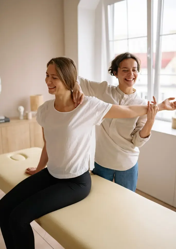 Physical therapist guiding a patient through a movement assessment
